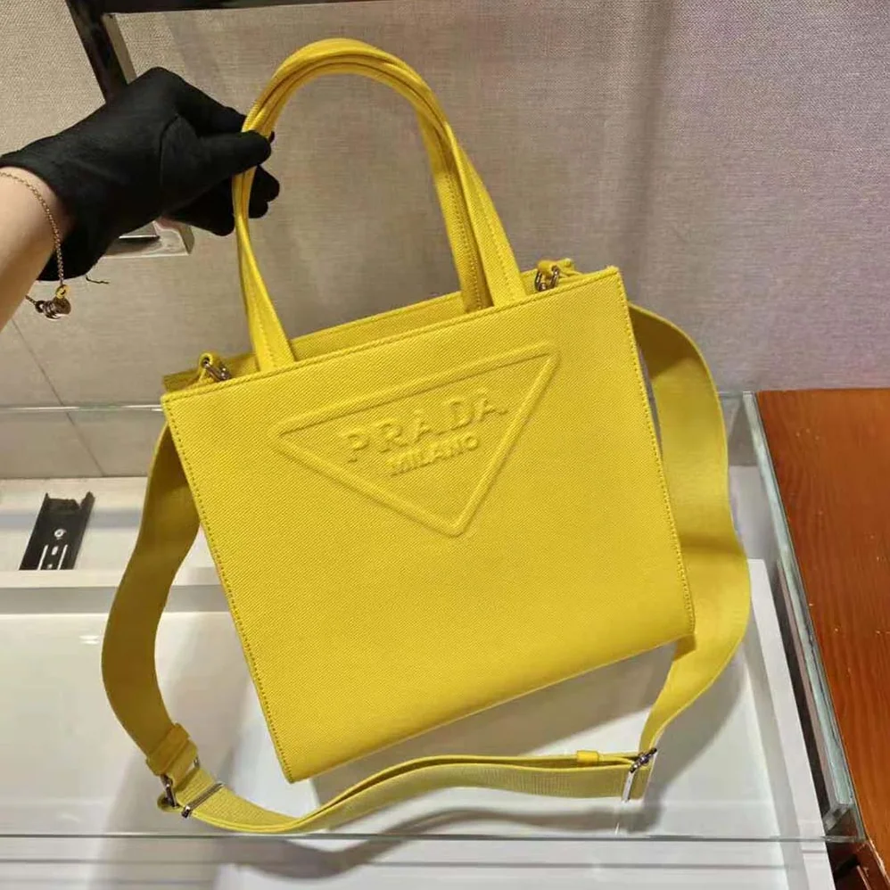 Prada Drill Tote Handles Bag for Women in Yellow Prada Drill Tote Handles Bag for Women in Yellow