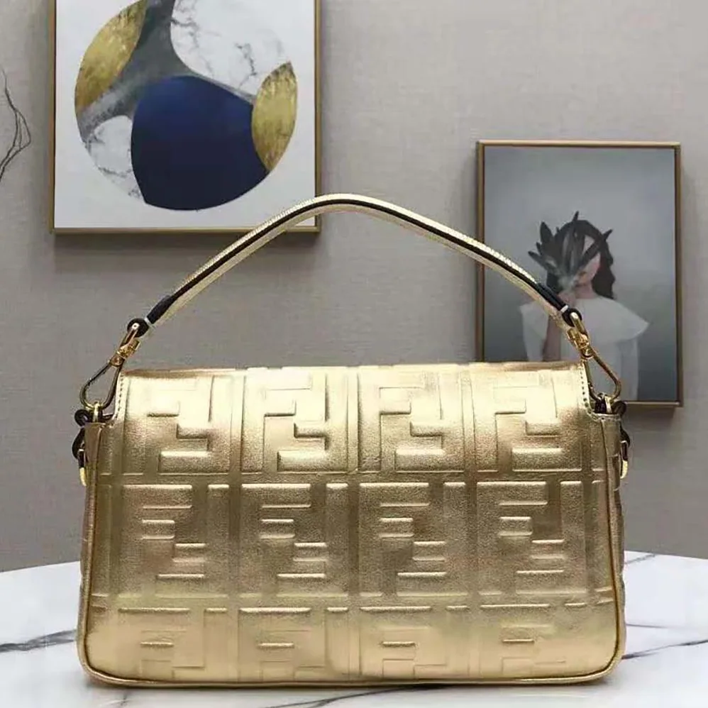 Fendi Baguette Fendi Prints On Leather Bag for Women in Gold Fendi Baguette Fendi Prints On Leather Bag for Women in Gold