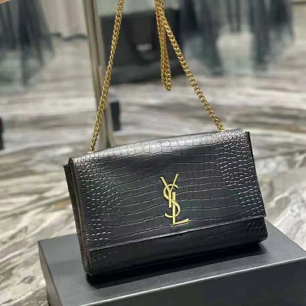 Saint Laurent YSL Kate Medium Reversible in Suede and Crocodile for Women in Embossed Leather Saint Laurent YSL Kate Medium Reversible in Suede and Crocodile for Women in Embossed Leather