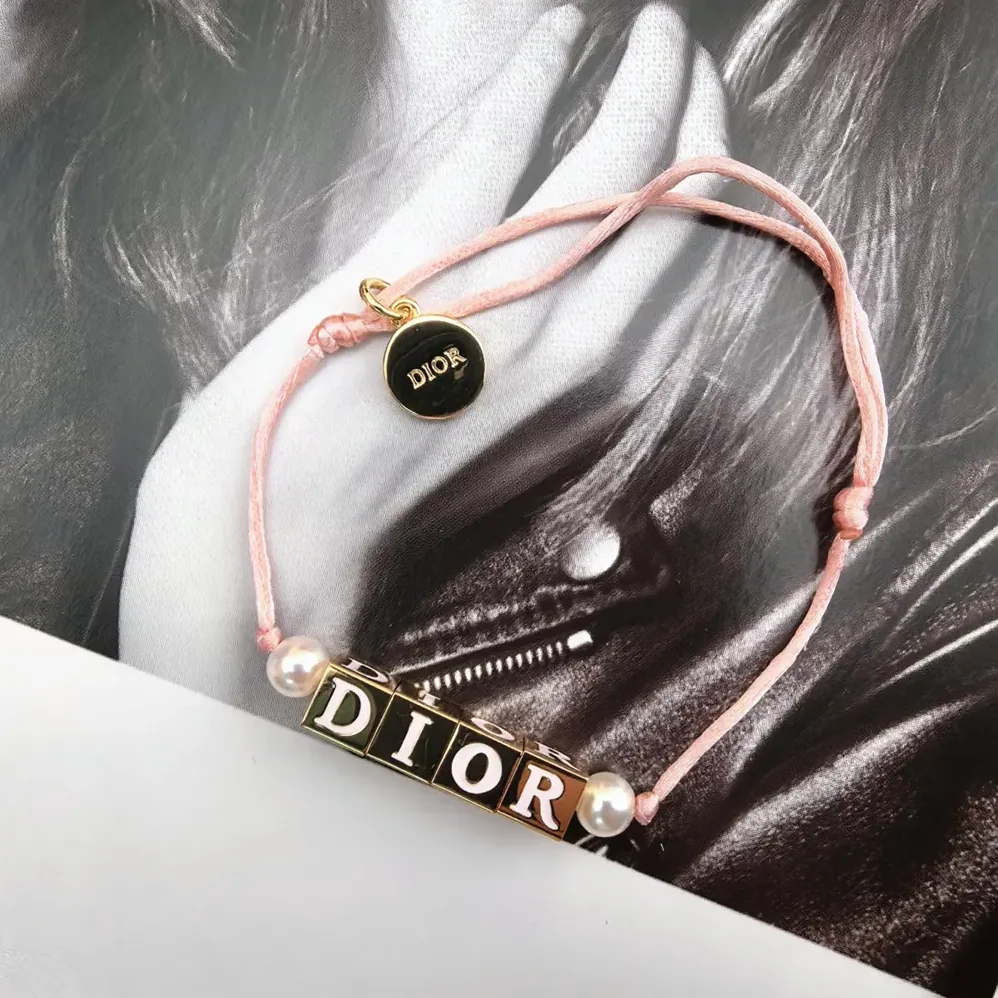 Dior D-Dice Bracelet Pale Pink Cotton and Lacquer with Gold-Finish Metal and White Resin Pearls for Women Dior D-Dice Bracelet Pale Pink Cotton and Lacquer with Gold-Finish Metal and White Resin Pearls for Women