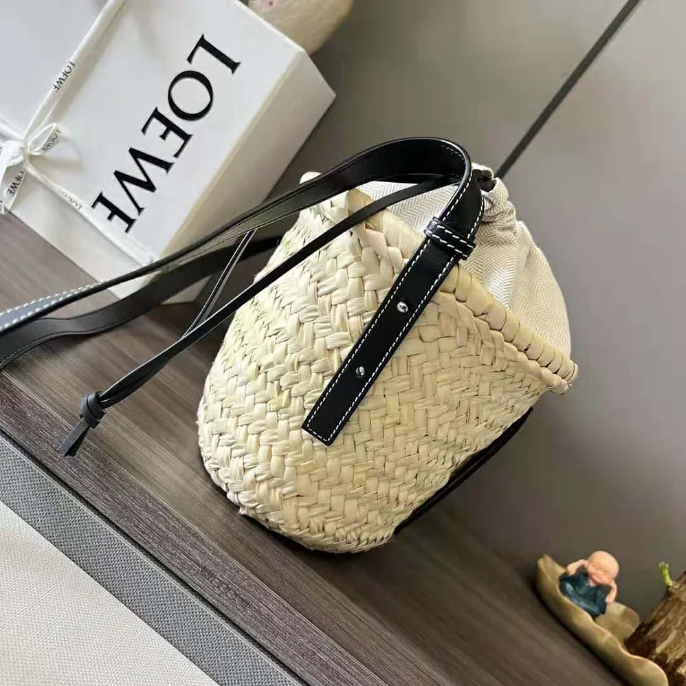 Loewe Drawstring Bucket Bag in Palm Leaf and Calfskin for Women in Black
