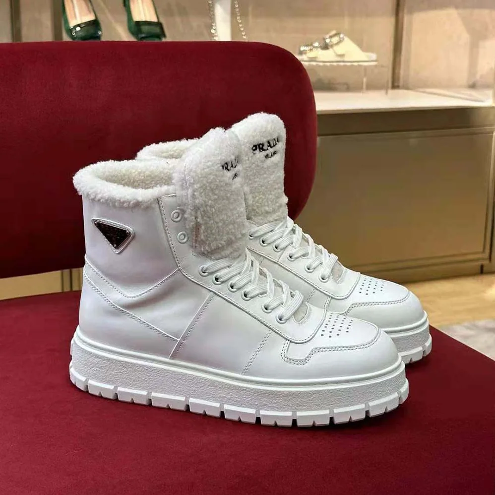 Prada Leather and Shearling High-Top Sneakers for Women in White Prada Leather and Shearling High-Top Sneakers for Women in White