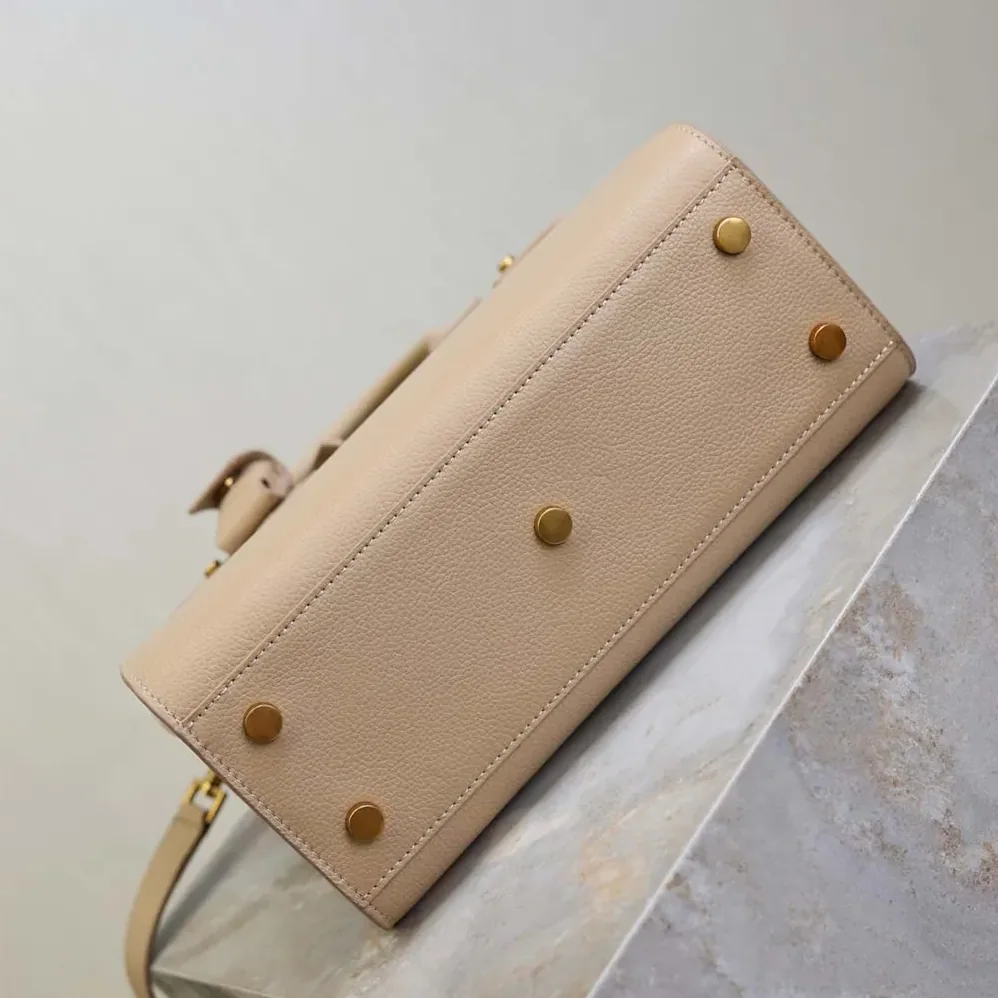 Saint Laurent YSL Baby Sac De Jour In Supple Grained Leather for Women in Beige