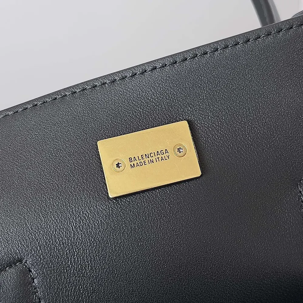 Balenciaga Bel Air Small Carry All Bag in Black Smooth Calfskin for Women in Gold Balenciaga Bel Air Small Carry All Bag in Black Smooth Calfskin for Women in Gold