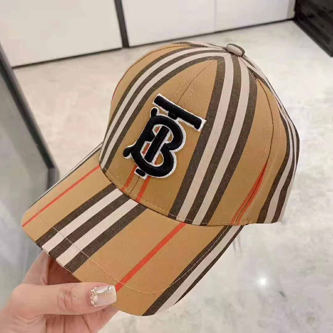 Burberry Icon Stripe Baseball Cap for Unisex in Brown Burberry Icon Stripe Baseball Cap for Unisex in Brown