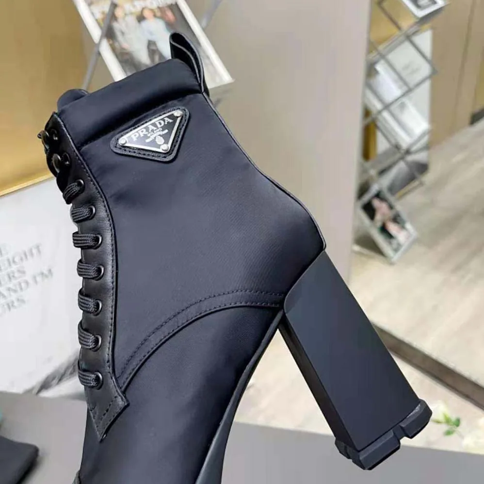 Prada Brushed Leather and Nylon Booties for Women in Black Prada Brushed Leather and Nylon Booties for Women in Black