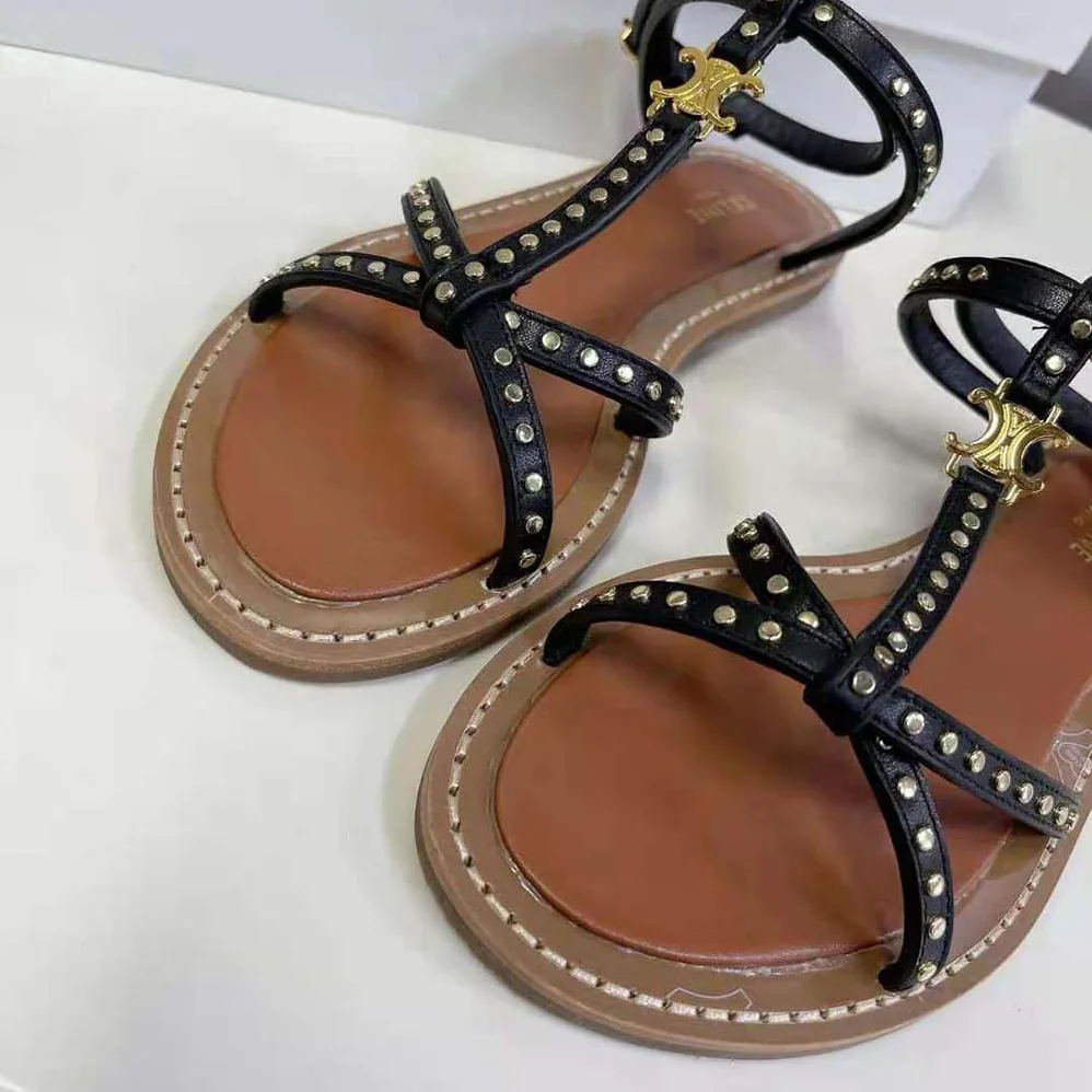 Celine Taillat Flat Sandal with Studs in Calfskin – Vegetal Tanning & Studs for Women in Black Celine Taillat Flat Sandal with Studs in Calfskin – Vegetal Tanning & Studs for Women in Black