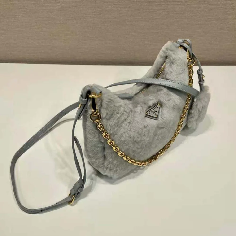 Prada Shearling Mini-Bag with the Enameled Metal Triangle Logo for Women in Silver