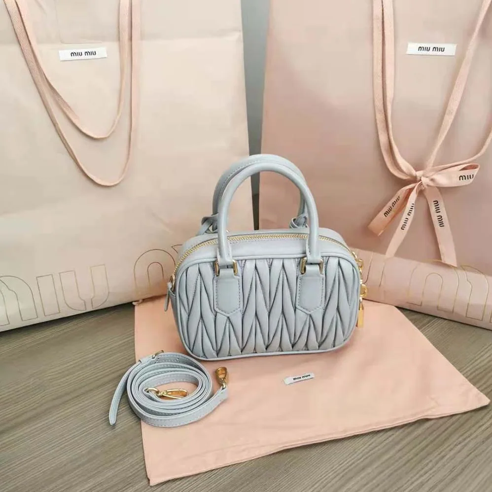 Miu Miu Matelassé Nappa Leather Top-Handle Bag for Women in Silver Miu Miu Matelassé Nappa Leather Top-Handle Bag for Women in Silver