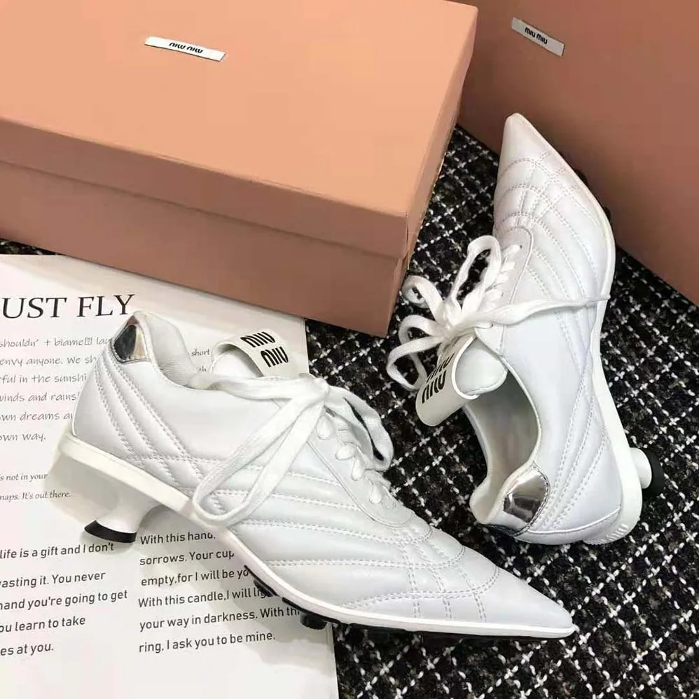 Miu Miu Nappa Leather Mid-heel Sneakers for Women in White