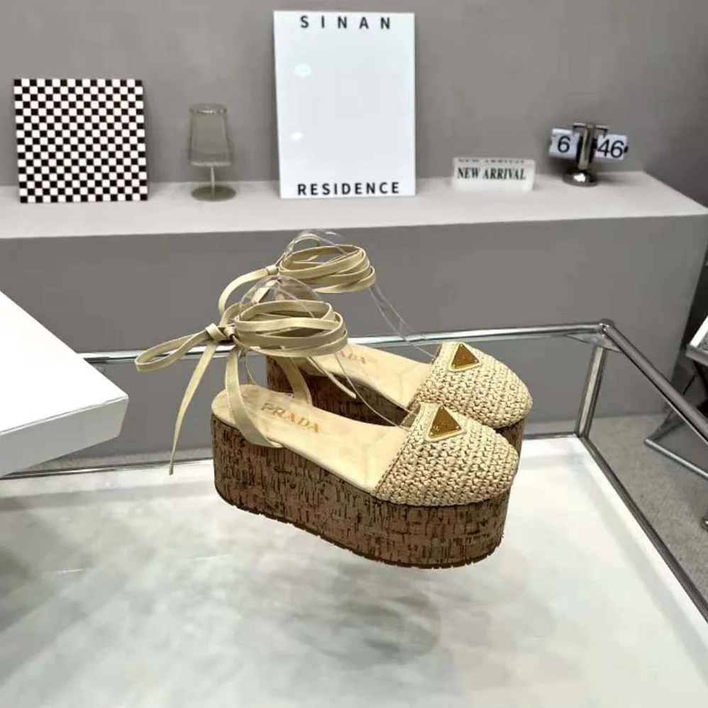 Prada Crochet Wedge Sandals with Enameled Metal Triangle Logo for Women in Beige Prada Crochet Wedge Sandals with Enameled Metal Triangle Logo for Women in Beige