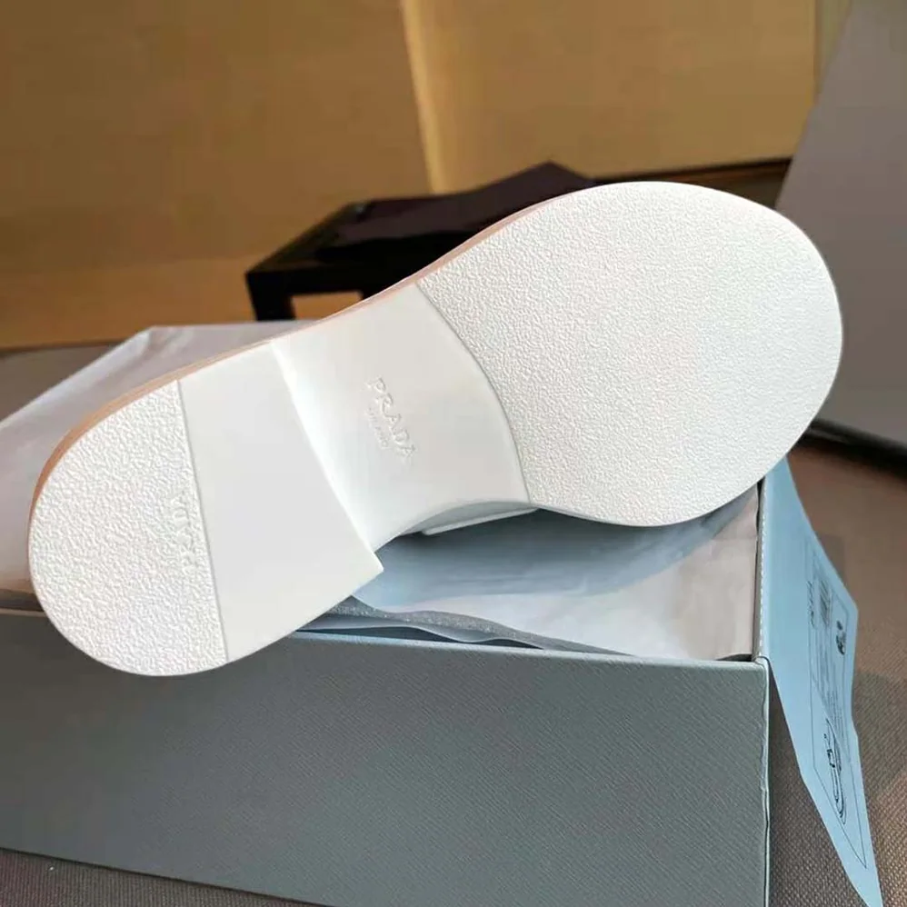 Prada Brushed Leather Loafers for Women in White Prada Brushed Leather Loafers for Women in White