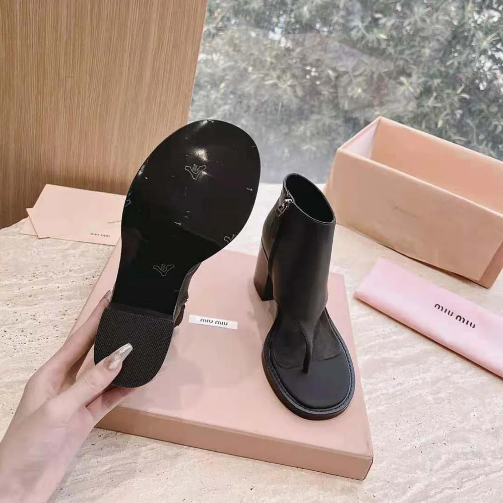 Miu Miu Leather Thong Booties for Women in Black