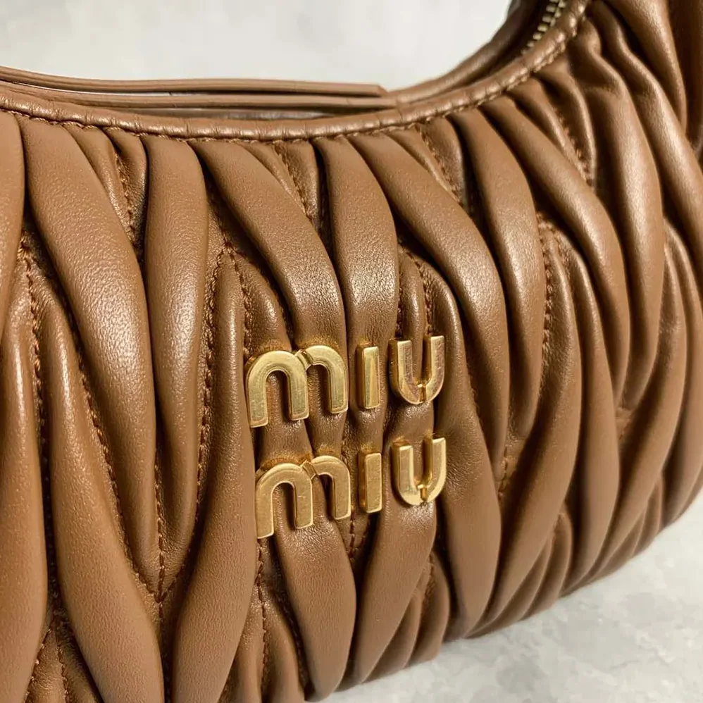 Miu Miu Wander Matelassé Nappa Leather Bag for Women in Brown/White Miu Miu Wander Matelassé Nappa Leather Bag for Women in Brown/White