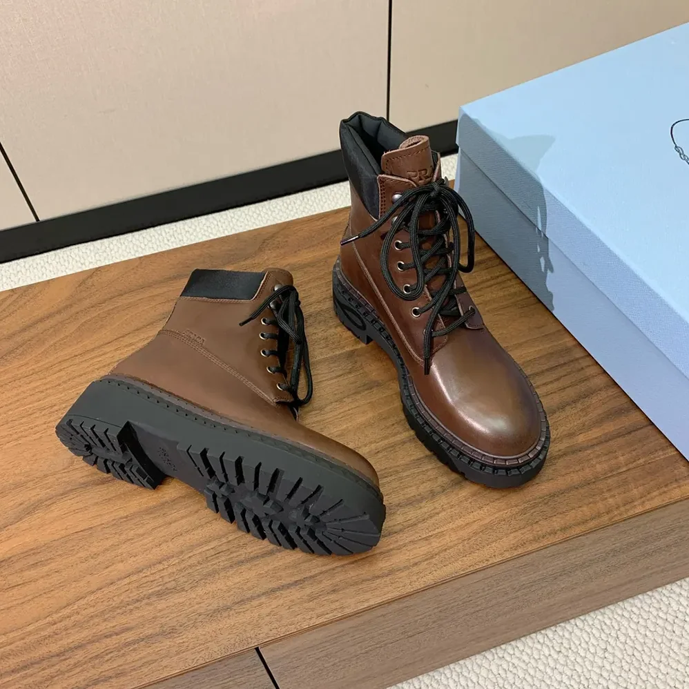 Prada Leather and Re-Nylon booties for Unisex in Cognac