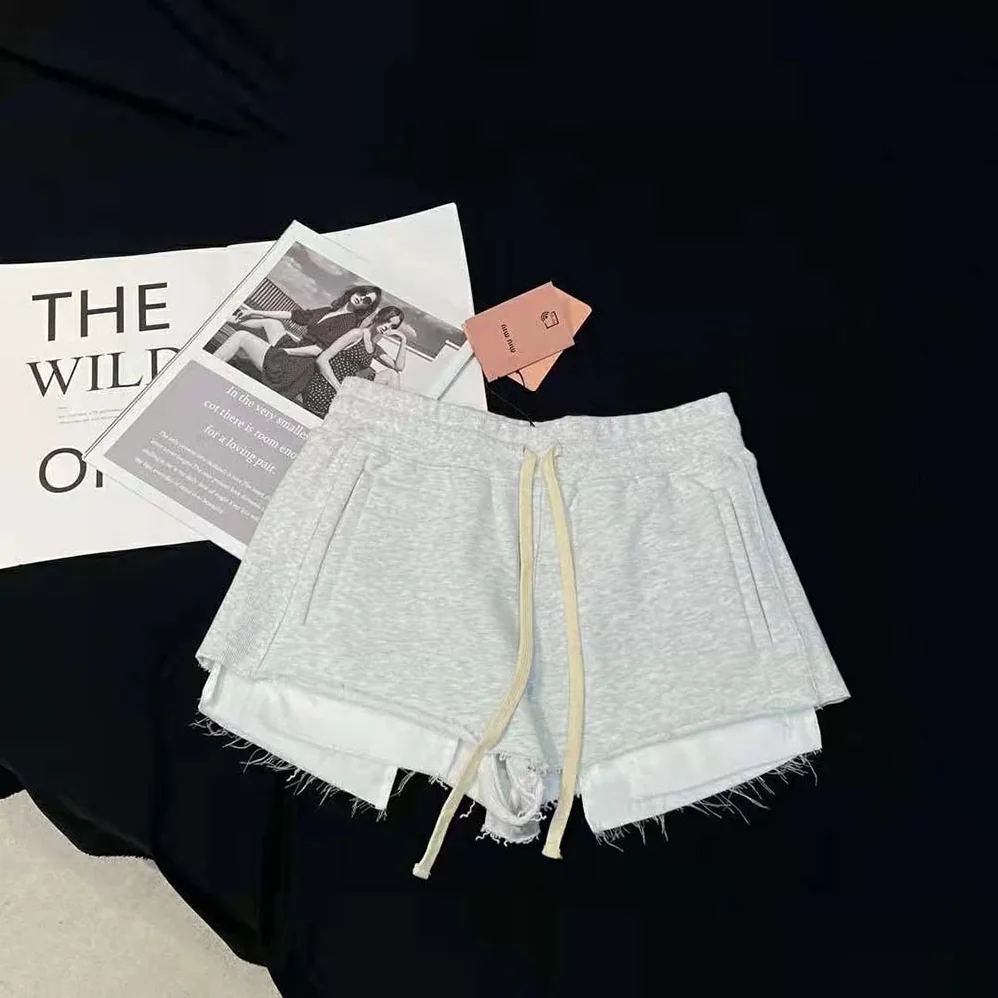 Miu Miu Embroidered Cotton Fleece Shorts for Women in Silver