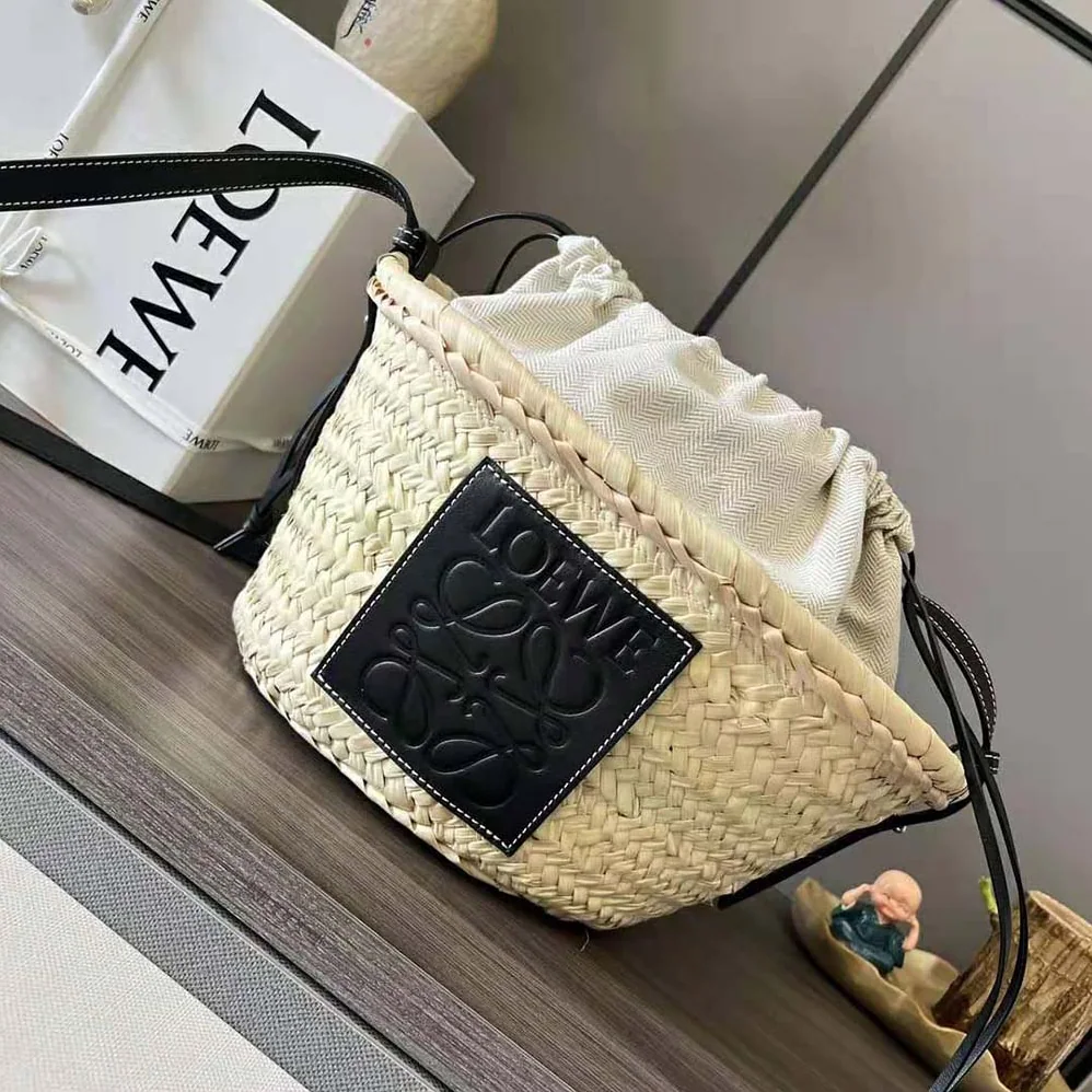 Loewe Drawstring Bucket Bag in Palm Leaf and Calfskin for Women in Black