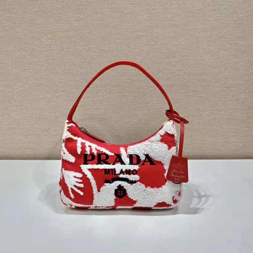 Prada Re-Edition 2006 Embroidered Drill Mini Bag for Women in Red Prada Re-Edition 2006 Embroidered Drill Mini Bag for Women in Red