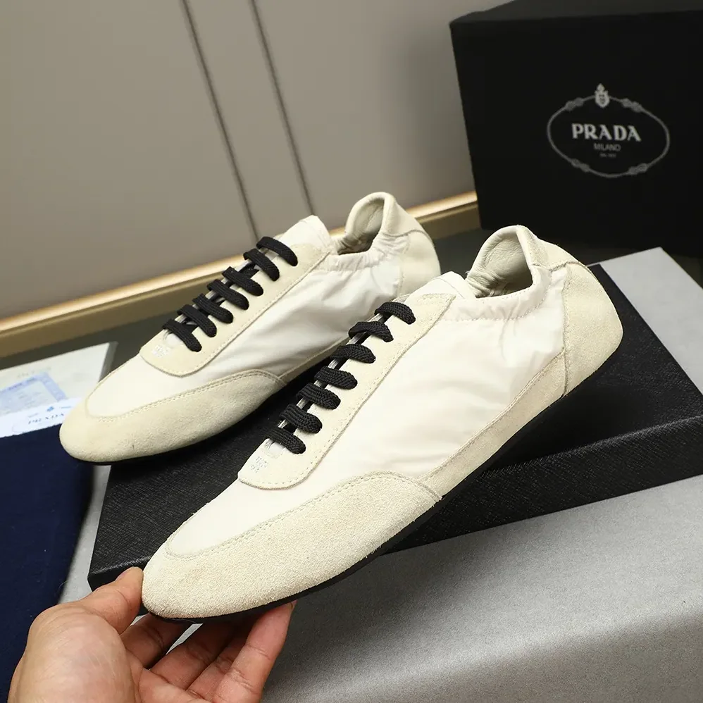 Prada Collapse Re-Nylon and Suede Elasticized Sneakers for Unisex in Ivory Prada Collapse Re-Nylon and Suede Elasticized Sneakers for Unisex in Ivory