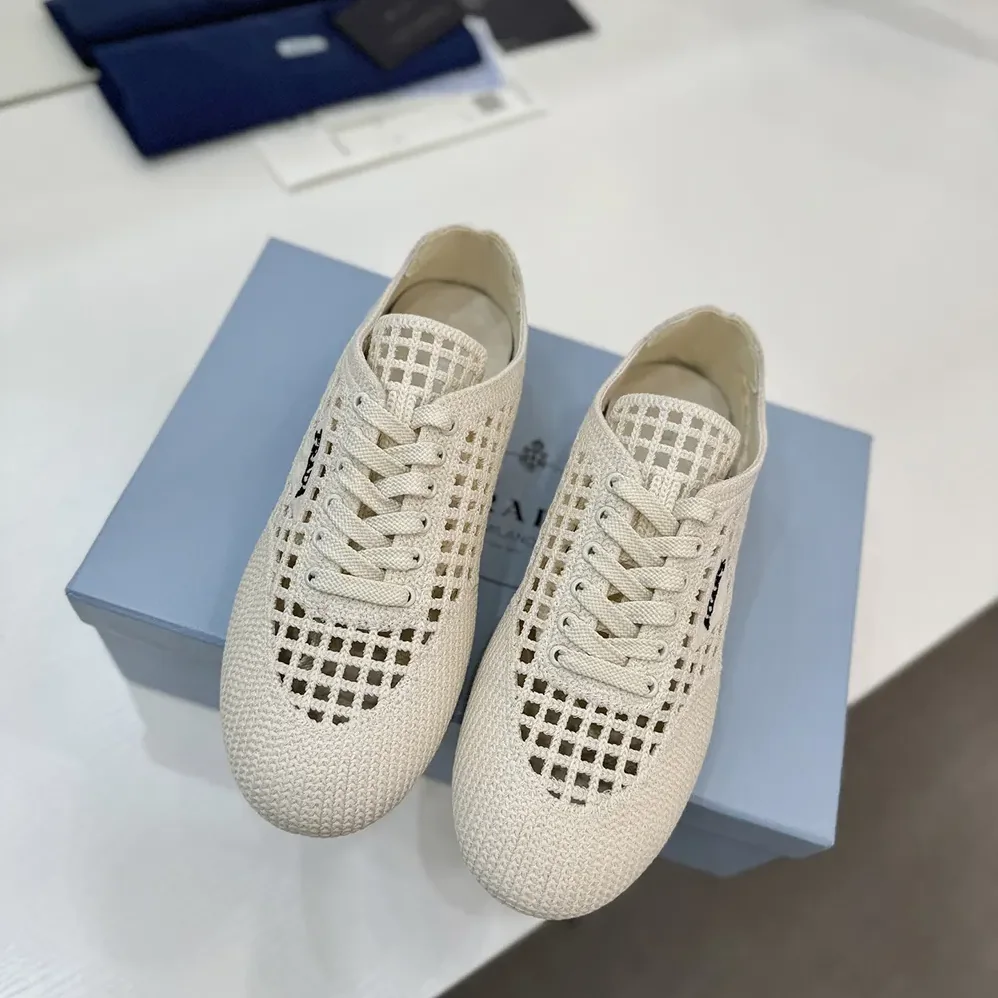 Prada Collapse Crochet Laced Sneakers for Unisex in White Prada Collapse Crochet Laced Sneakers for Unisex in White