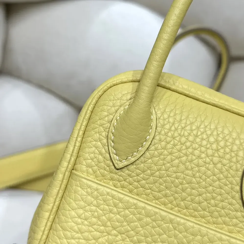 Hermes Lindy Mini 19 in Clemence Leather for Women in Yellow/Gold Hermes Lindy Mini 19 in Clemence Leather for Women in Yellow/Gold