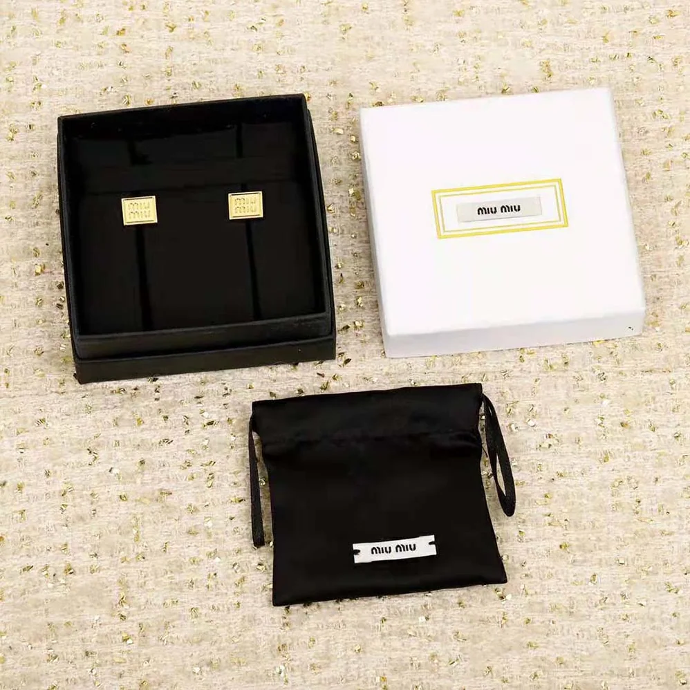 Miu Miu Metal Earrings with Engraved Logo for Women Miu Miu Metal Earrings with Engraved Logo for Women