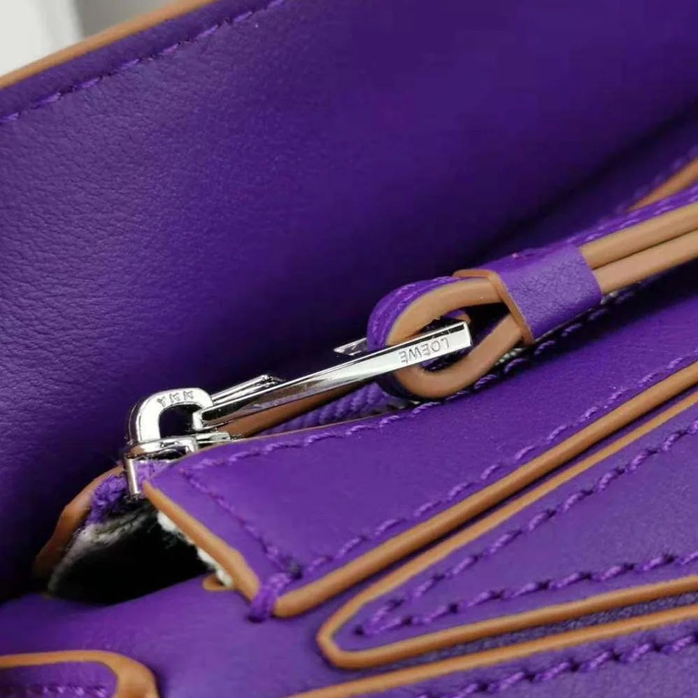 Loewe Mini Puzzle Bag in Classic Calfskin for Women in Purple Loewe Mini Puzzle Bag in Classic Calfskin for Women in Purple