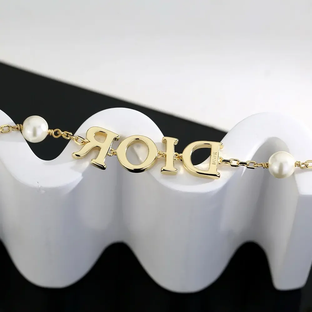 Dior Dio(r)evolution Bracelet Gold-Finish Metal and White Resin Pearls for Women Dior Dio(r)evolution Bracelet Gold-Finish Metal and White Resin Pearls for Women