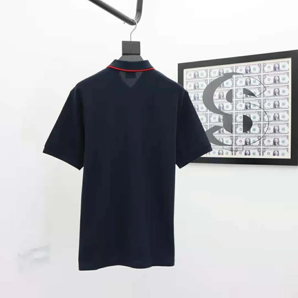 Burberry Icon Stripe Placket Cotton Piqué Polo Shirt for Men in Navy Burberry Icon Stripe Placket Cotton Piqué Polo Shirt for Men in Navy