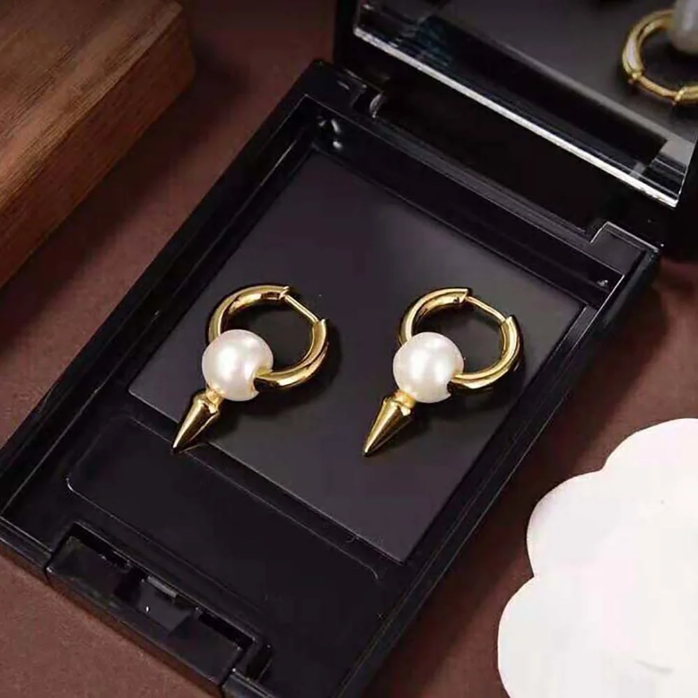 Balenciaga Force Spike Earrings in Gold-toned Sterling Silver and White Acrylic for Women