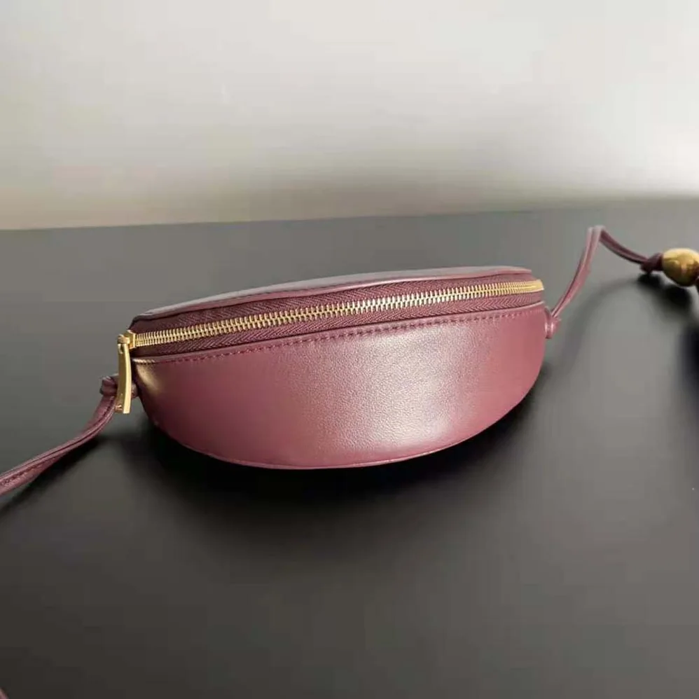 Bottega Veneta Intrecciato Leather Multi Pouch On Strap for Women in Maroon Bottega Veneta Intrecciato Leather Multi Pouch On Strap for Women in Maroon