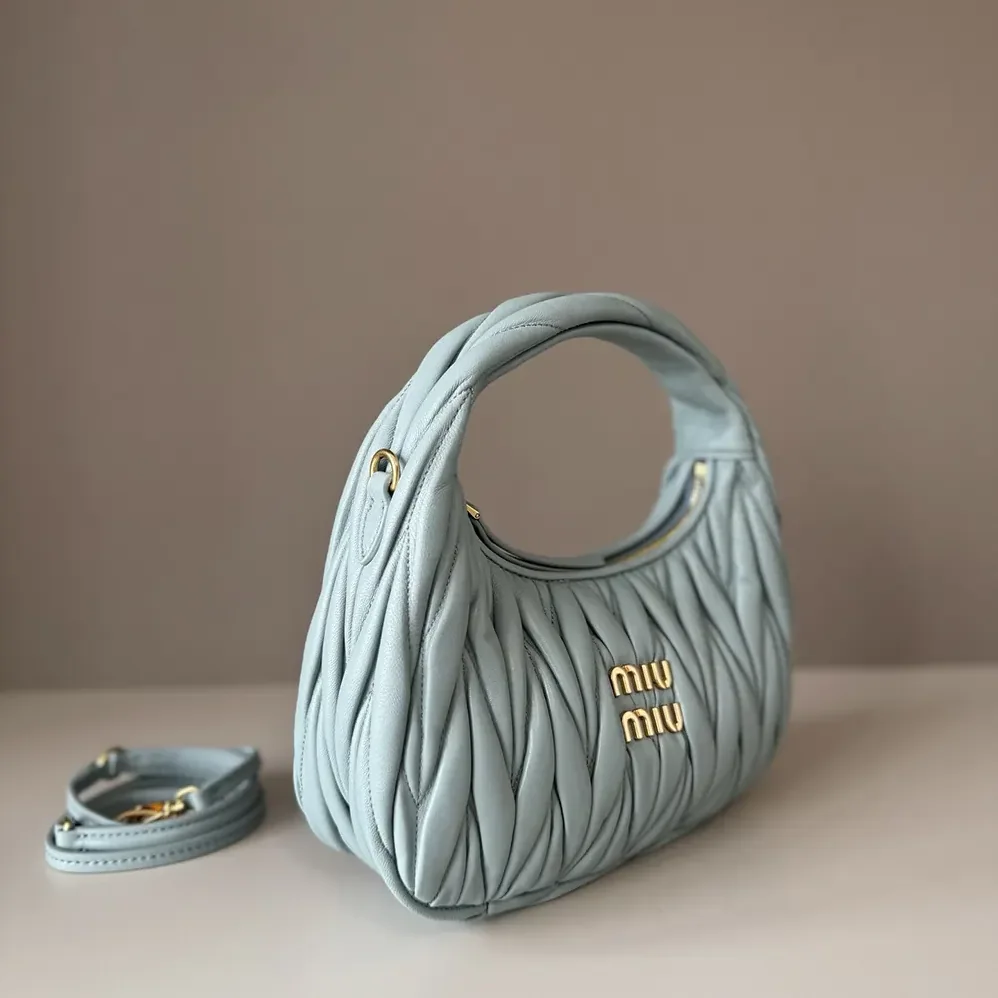 Miu Miu Wander Matelassé Nappa Leather Hobo Bag for Women in Powder Blue Miu Miu Wander Matelassé Nappa Leather Hobo Bag for Women in Powder Blue