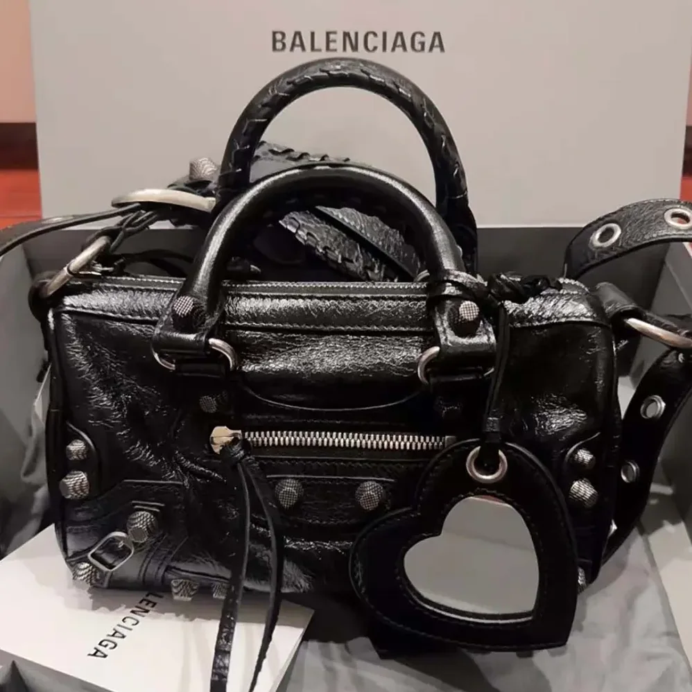 Balenciaga Neo Cagole XS Handbag in Black Arena Lambskin for Women