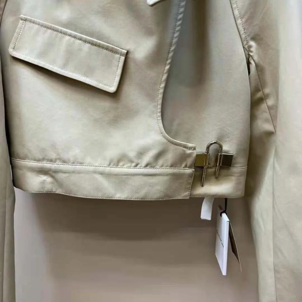 Givenchy Short Trench Coat in Cotton Twill with U-Lock Buckle for Women in Light Beige Givenchy Short Trench Coat in Cotton Twill with U-Lock Buckle for Women in Light Beige