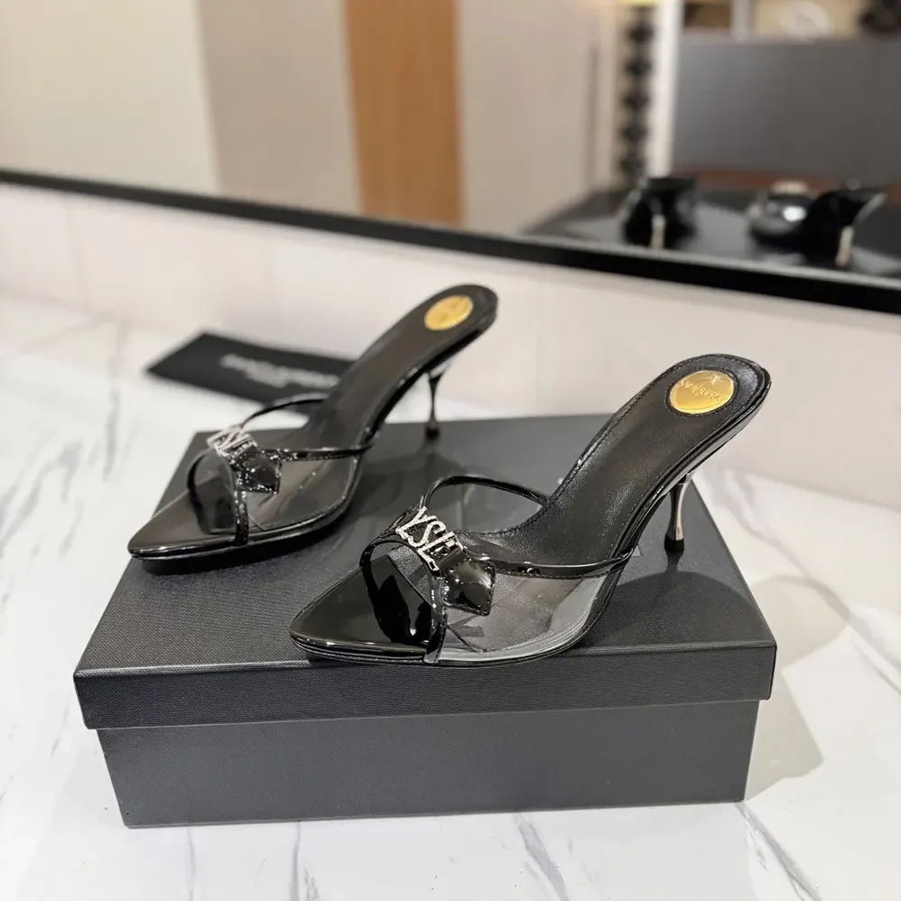 Saint Laurent YSL Jerry Mules in Tpu and Rhinestones for Women in Black Saint Laurent YSL Jerry Mules in Tpu and Rhinestones for Women in Black