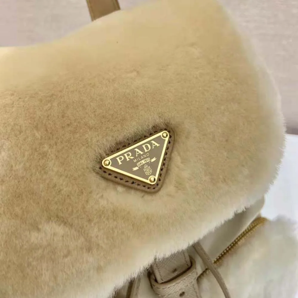 Prada Re-Nylon and Shearling Backpack for Women in Beige
