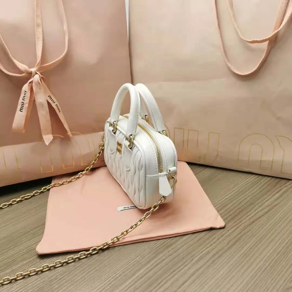 Miu Miu Matelassé Nappa Leather Top-Handle Mini-Bag for Women in White Miu Miu Matelassé Nappa Leather Top-Handle Mini-Bag for Women in White