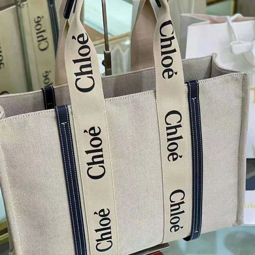 Chloe Large Woody Tote Bag in Cotton Canvas and Shiny Calfskin with Woody Ribbo for Women Chloe Large Woody Tote Bag in Cotton Canvas and Shiny Calfskin with Woody Ribbo for Women