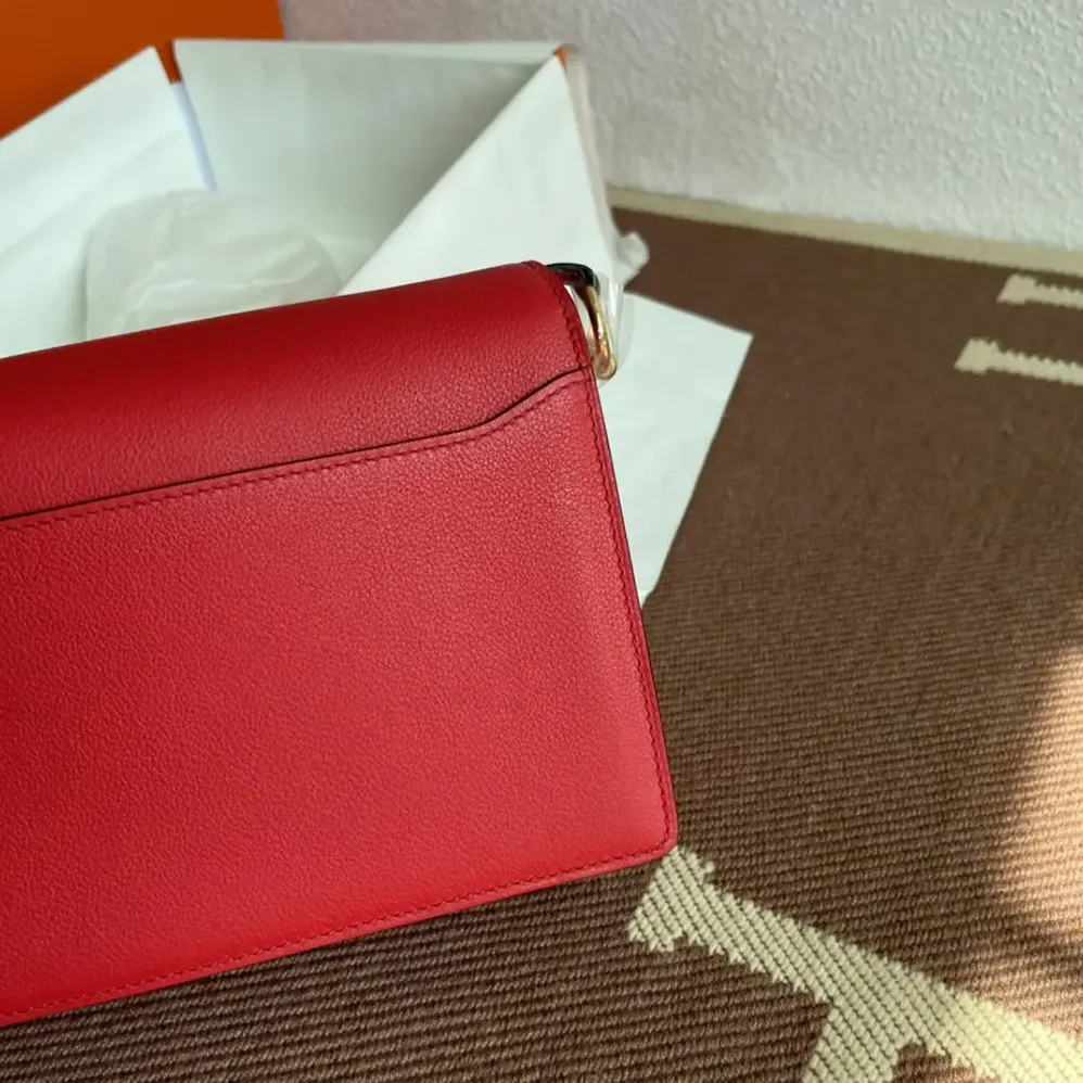 Hermes Roulis Mini Bag in Evercolor Calfskin for Women in Red/Gold