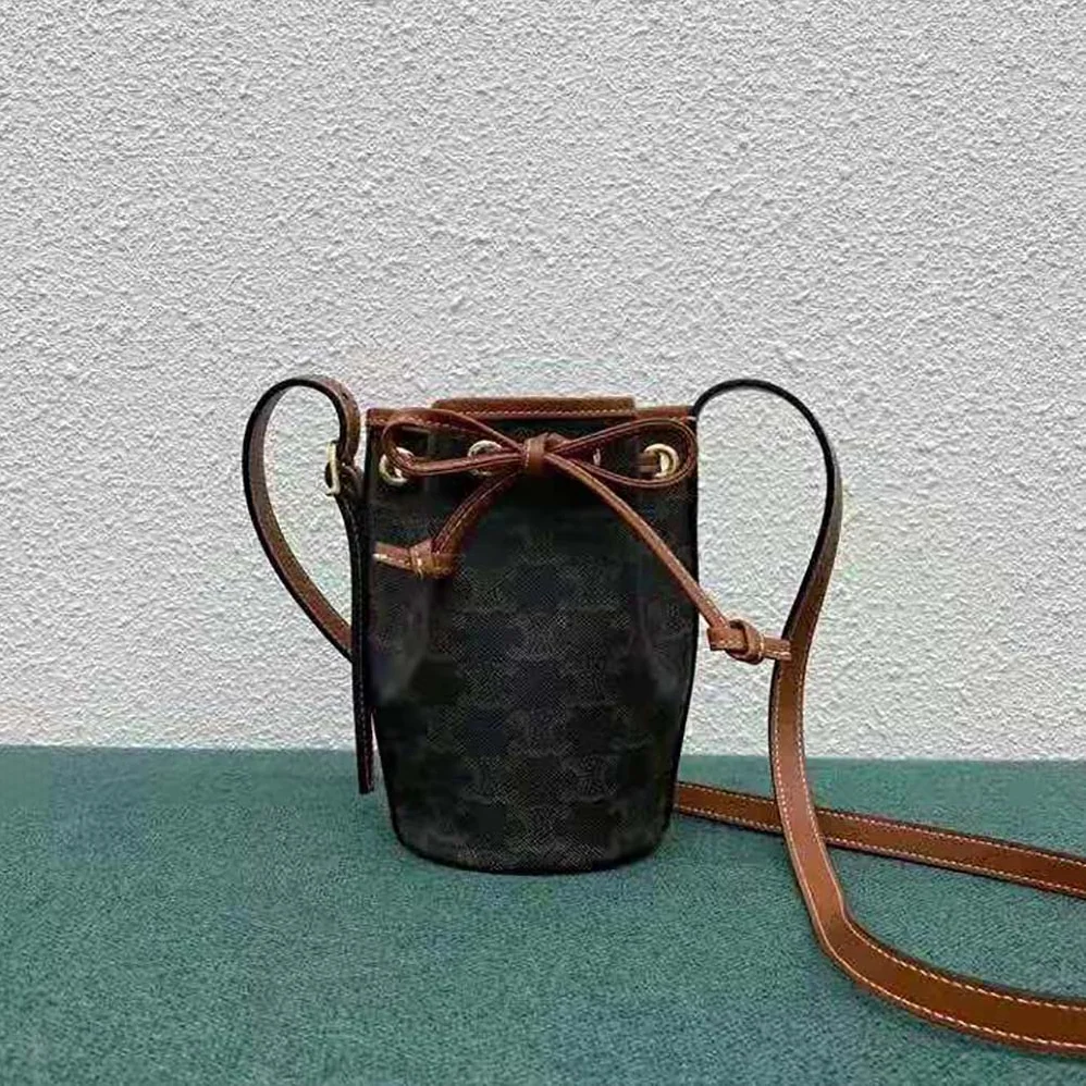 Celine Micro Drawstring in Triomphe Canvas and Calfskin for Women in Brown Celine Micro Drawstring in Triomphe Canvas and Calfskin for Women in Brown