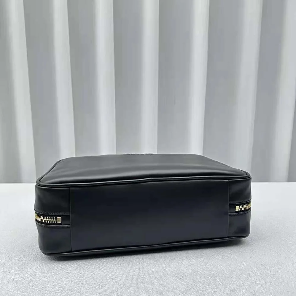 Miu Miu Leather Top-handle Bag with Embossed Lettering Logo for Women in Black Miu Miu Leather Top-handle Bag with Embossed Lettering Logo for Women in Black