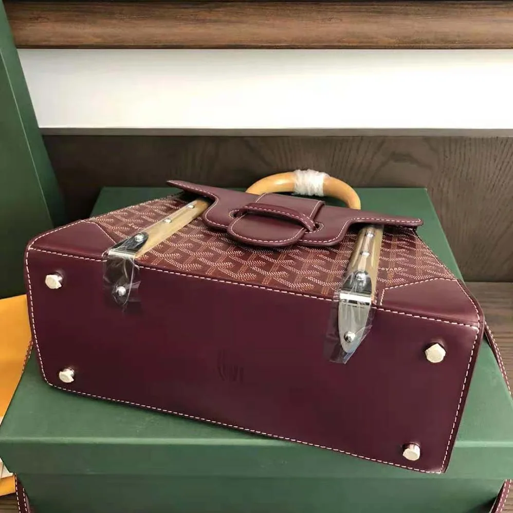 Goyard Sac Saïgon PM in Toile Goyardine & Clamecy Calfskin for Women in Maroon Goyard Sac Saïgon PM in Toile Goyardine & Clamecy Calfskin for Women in Maroon