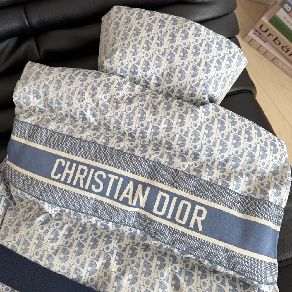 Dior DiorAlps Belted Puffer Vest Blue and White Dior Oblique Quilted Technical Taffeta for Men Dior DiorAlps Belted Puffer Vest Blue and White Dior Oblique Quilted Technical Taffeta for Men