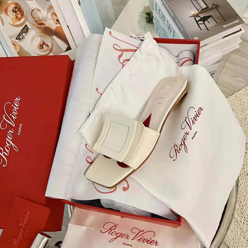 Roger Vivier Covered Buckle Mules in Patent Leather for Women in White Roger Vivier Covered Buckle Mules in Patent Leather for Women in White