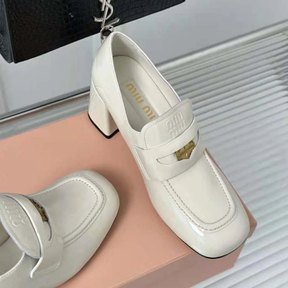 Miu Miu Patent Leather Loafers with Embossed Logo on the Tongue for Women in White Miu Miu Patent Leather Loafers with Embossed Logo on the Tongue for Women in White