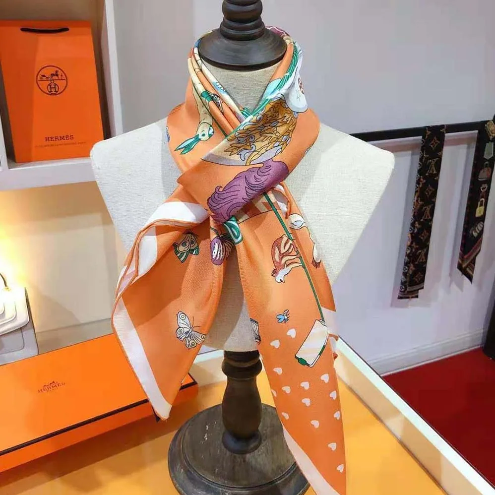 Hermes Hermes Story Scarf 90 in Silk Twill with Hand-Rolled Edges for Women in Orange
