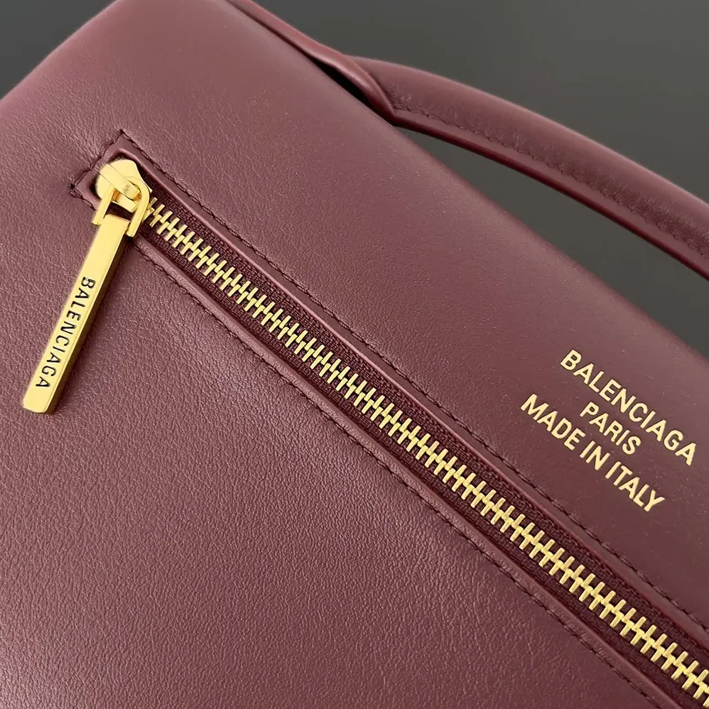 Balenciaga Bel Air Clutch On Strap Small in Dark Burgundy for Women Balenciaga Bel Air Clutch On Strap Small in Dark Burgundy for Women