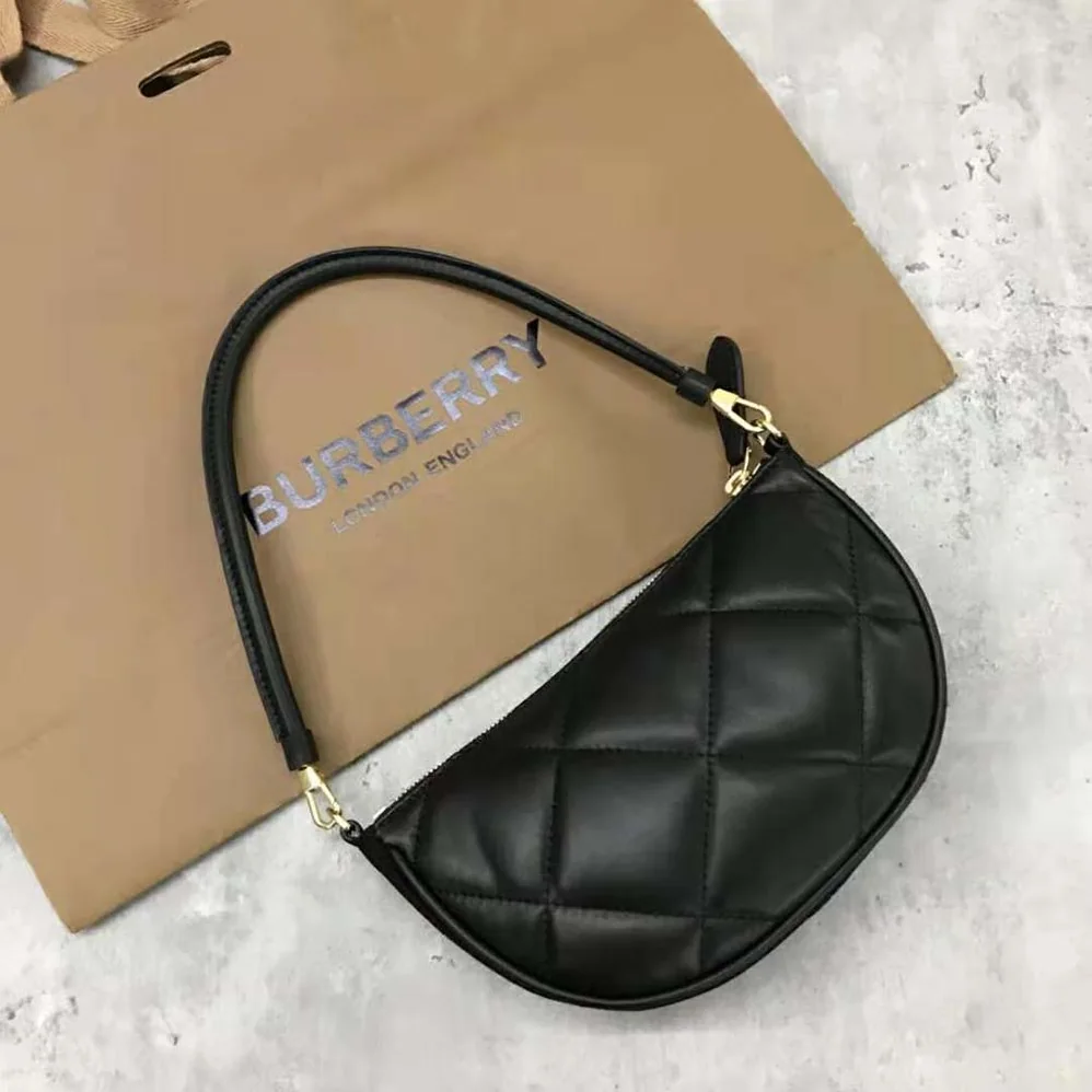 Burberry Quilted Lambskin Olympia Pouch for Women in Black Burberry Quilted Lambskin Olympia Pouch for Women in Black