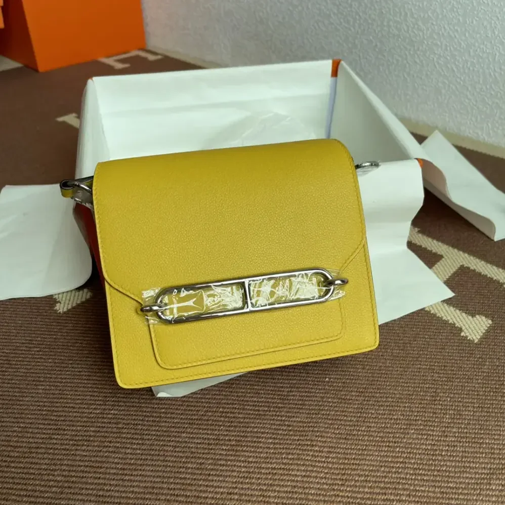 Hermes Roulis Mini Bag in Evercolor Calfskin for Women in Yellow/Gold Hermes Roulis Mini Bag in Evercolor Calfskin for Women in Yellow/Gold