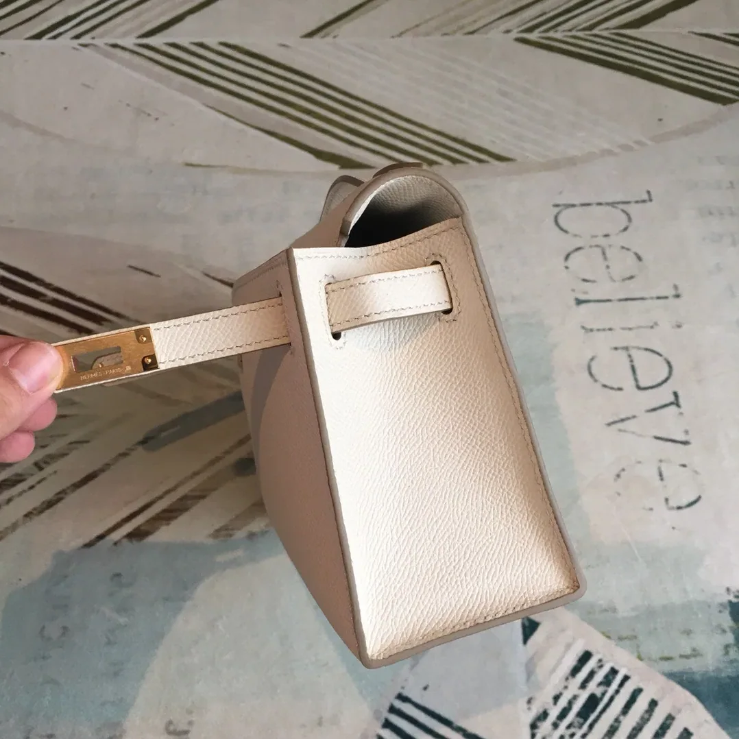 Hermes Kelly Pochettee White Gold Toned Hardware /